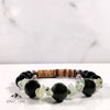 Girdwood Bracelet with nephrite jade, prehnite, black lava stone, stainless steel, and coconut chips inspired by Girdwood Alaska